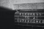A brick wall reading 